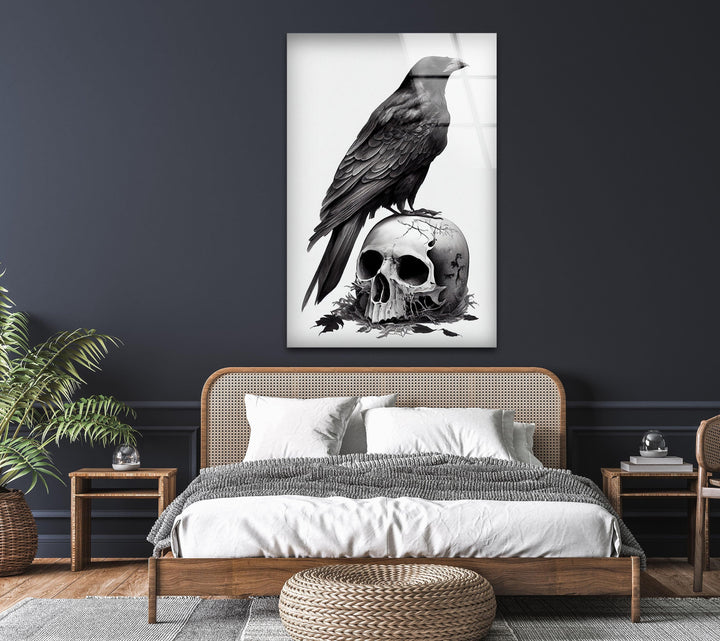Monochrome raven and skull artwork printed on glass highlighting sharp feather details and bone texture.