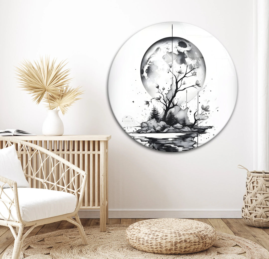 Monochrome landscape on glass featuring a moon, island, and stylized dripping shadows.