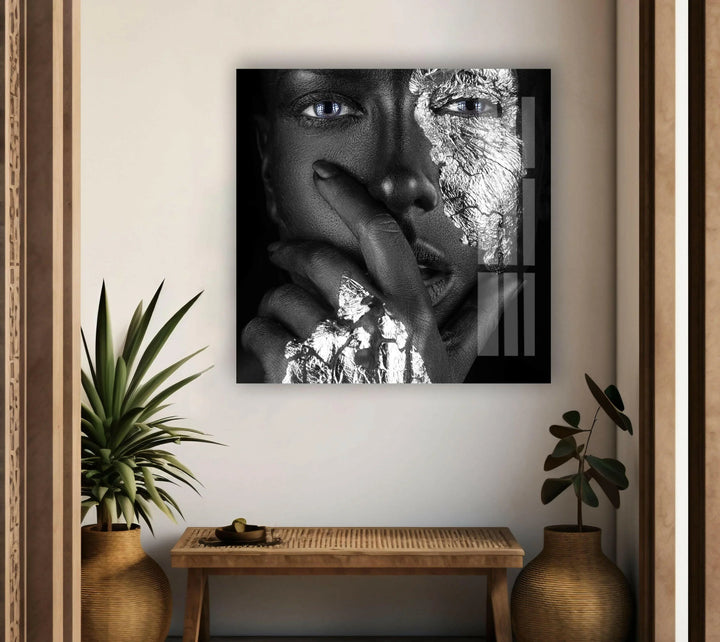 Modern abstract portrait blending metallic textures and blue eyes in black and white wall art.