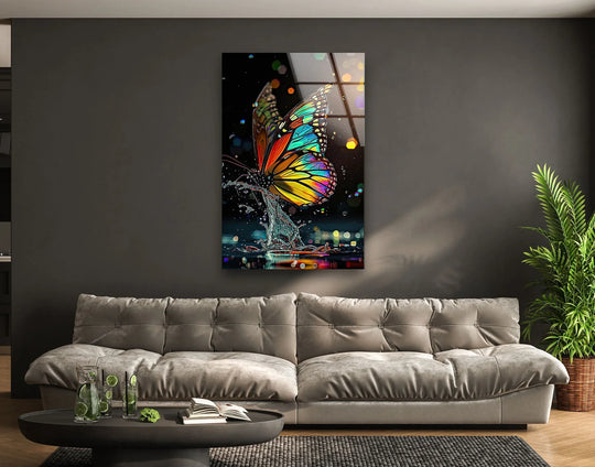 A vibrant red and yellow butterfly is captured in a moment of stillness amidst splashing water, a stunning piece of decorative wall art.