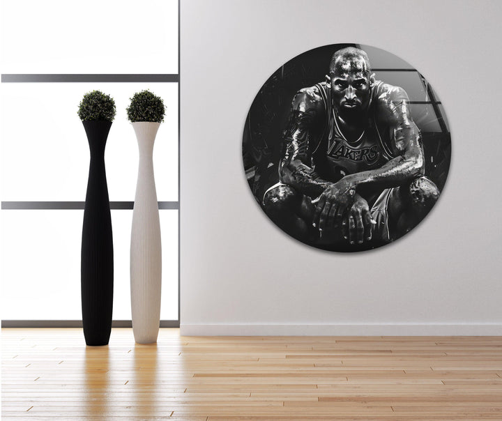 High-contrast black and white glass wall art portraying a focused basketball player with bold abstract textures.