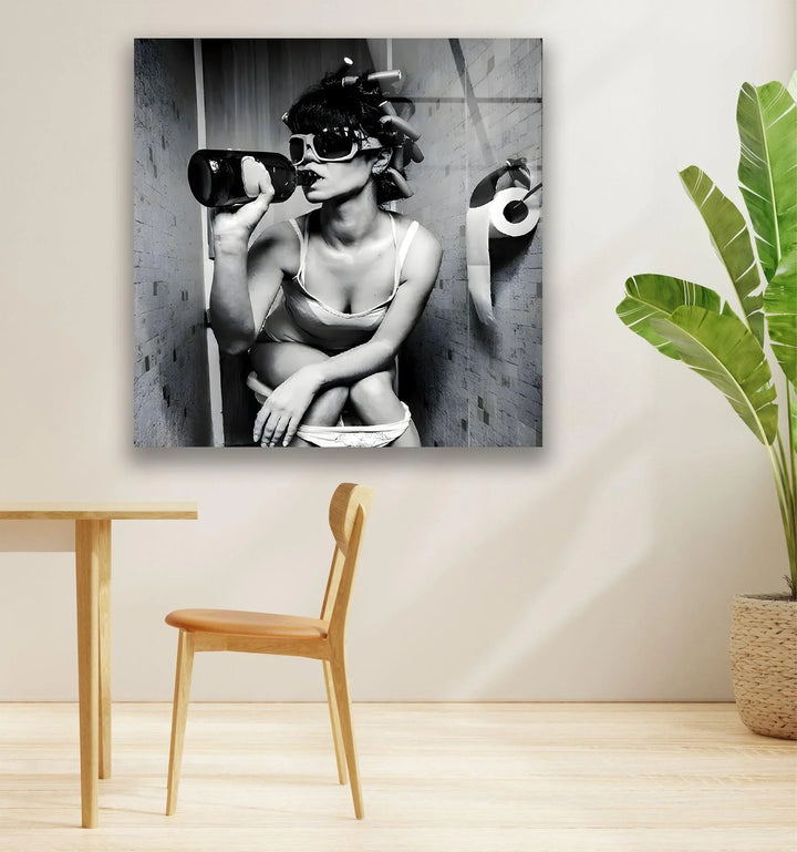 Grayscale humorous artwork depicting a confident woman in curlers and sunglasses seated in a restroom scene.