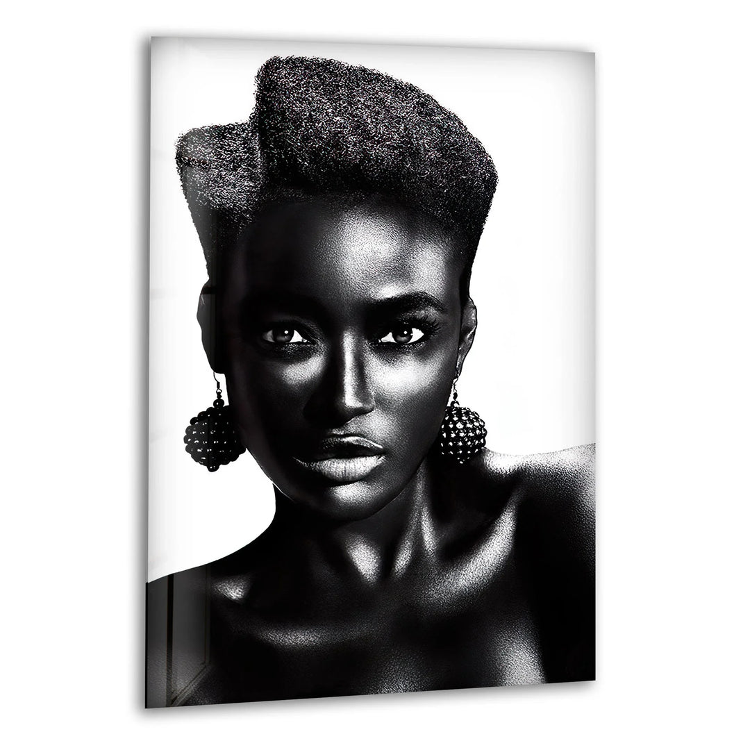 Stylish black and white glass wall art featuring a strong portrait of a woman with textured hair and bold earrings.