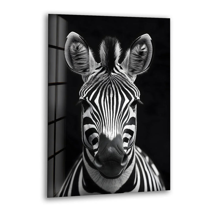Black and white glass wall art featuring a close-up zebra portrait with detailed stripes and sharp contrast.