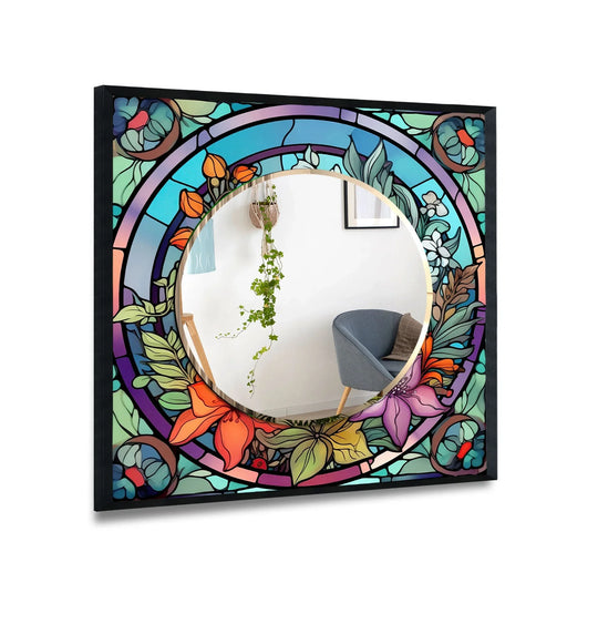 The black frame wall mirror shows colored flowers in a stained design and floral art this stained glass mirror is a colorful wall decor accent and artistic statement piece