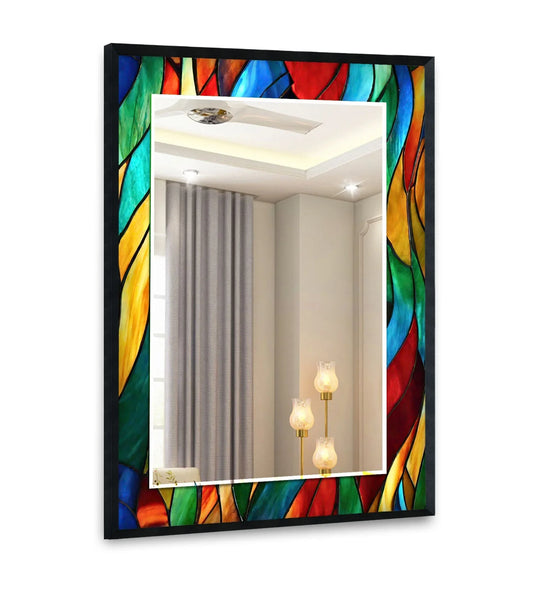 The wall mirror features stained glass effect frame in orange and green and is a vibrant home decor black frame mirror and modern wall art with a unique design