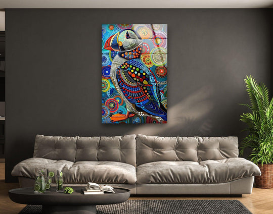 A vibrant, colorful puffin pops from this eye-catching glass wall artwork with a psychedelic, circular pattern.