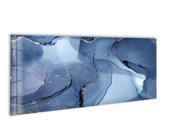 The tranquil mood of this navy blue and gold foil alcohol ink print wall art evokes a sense of calm sophistication.