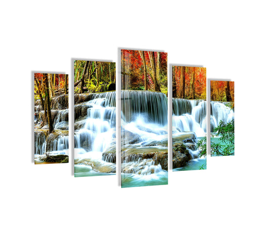 Cascading waterfall landscape glass wall art shows autumn colors and a flowing stream and is nature art perfect for scenic wall decor and a vibrant space