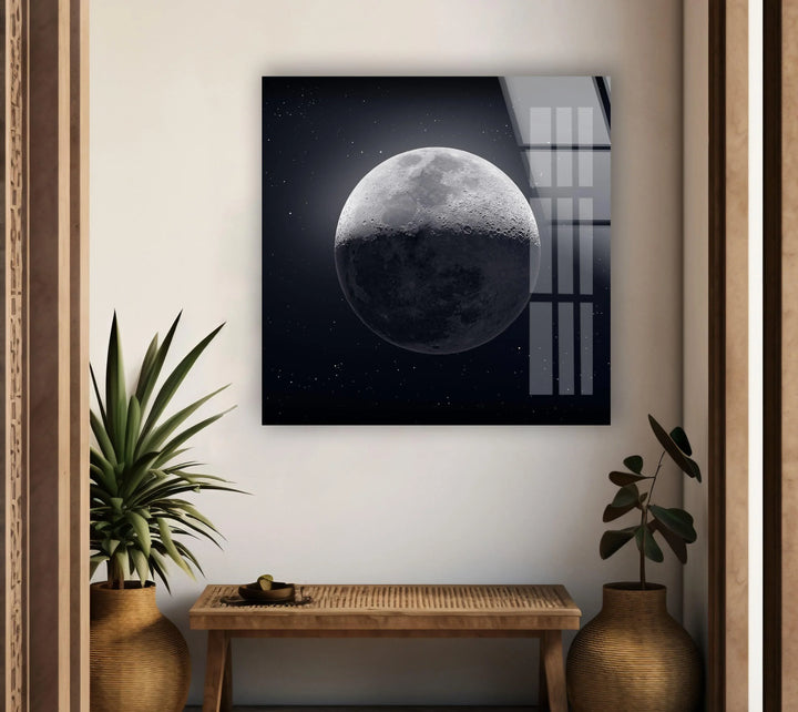 Cosmic glass wall piece featuring a glowing moon and subtle starlight.