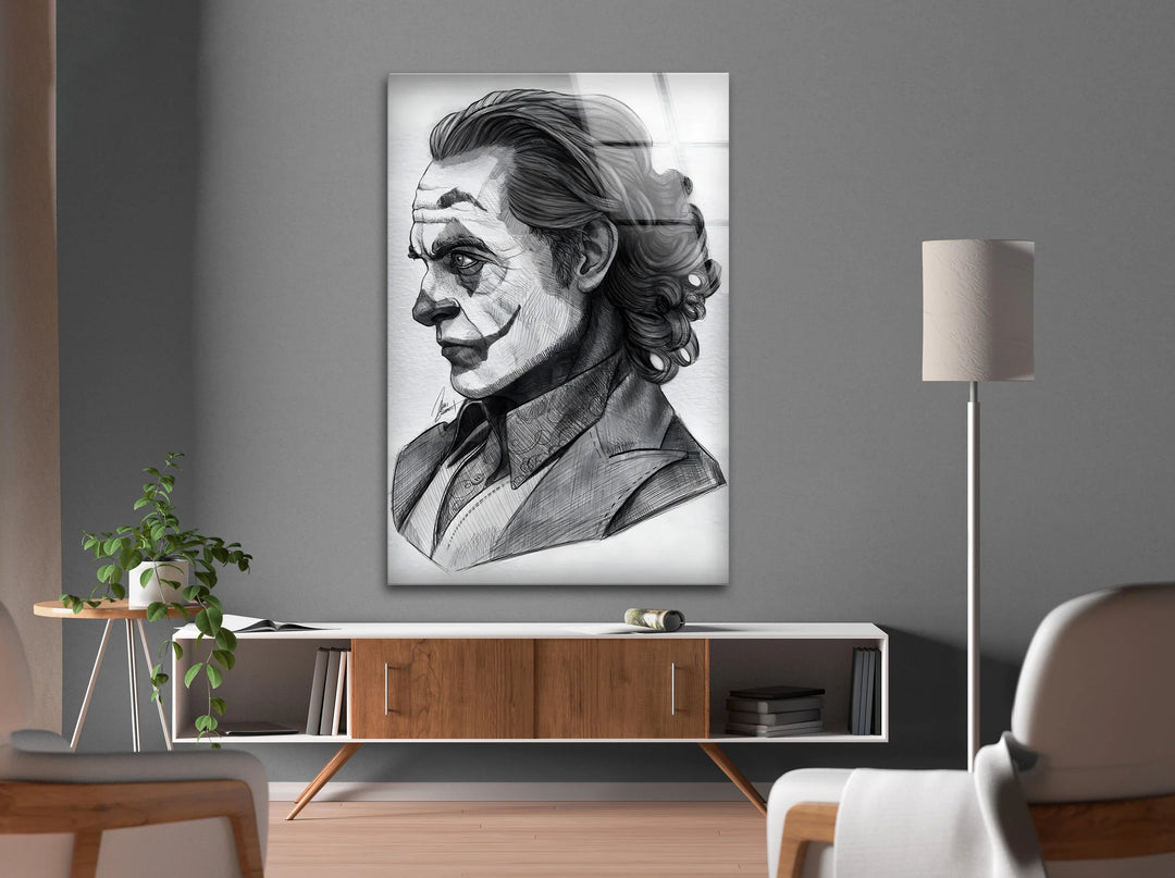 Glass artwork of a sketched male figure with dramatic makeup and expressive linework.