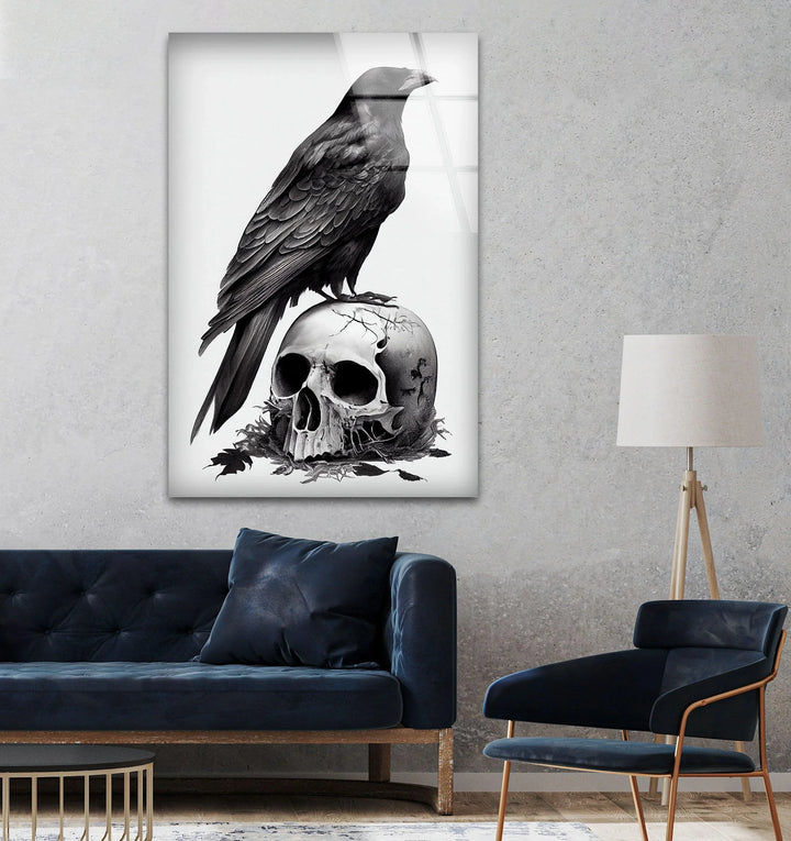 Gothic-style glass wall art with a perched raven and cracked skull emphasizing dark atmospheric symbolism.