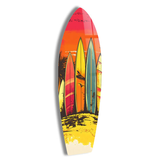 The brightest area of this print wall art features a vibrant orange and red sunset over a beach with surfboards.