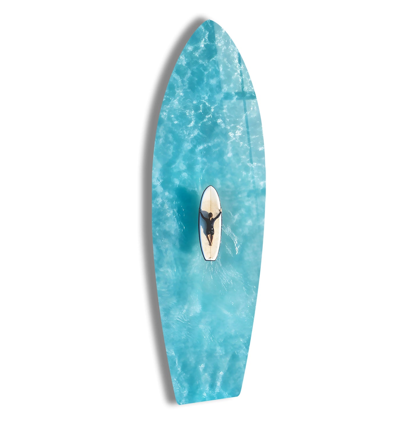 The sense of movement ripples across this aerial ocean view within the glass art painting, as the surfer creates gentle waves through the tranquil waters.