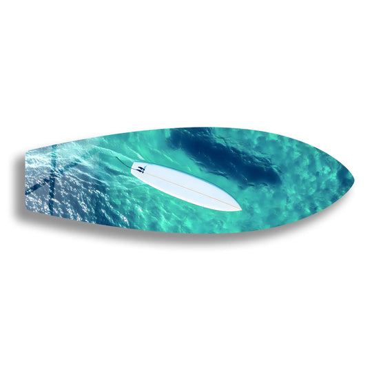 Surfboard ocean glass wall art turquoise water motif with surfer in tranquil waters and ocean inspired surf decor