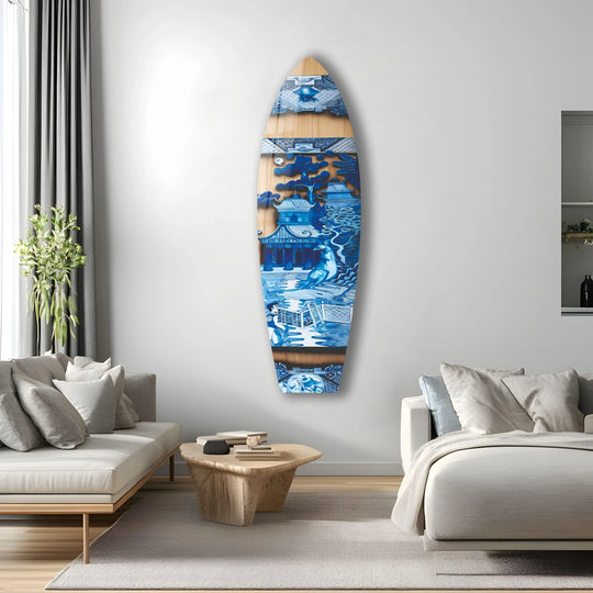 A striking glass art painting showcasing vibrant blue Chinese temple scenes against a neutral background, creating a bold color contrast.