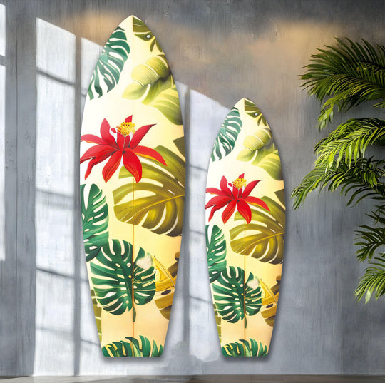 The stillness of the tropical flowers surfboard wall art is captured in this indoor setting, a unique piece of glass wall art decor that evokes a serene, sunny beach vibe.