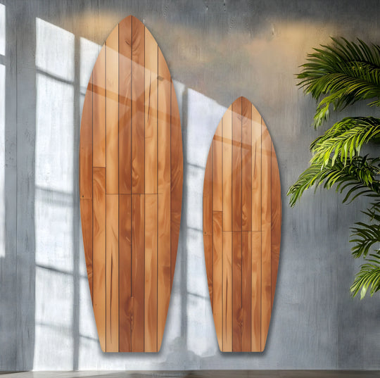 Smooth finish highlights the fine wood grain of these brown surfboard wall art pieces, an excellent choice for home decoration and enhancing coastal decor.