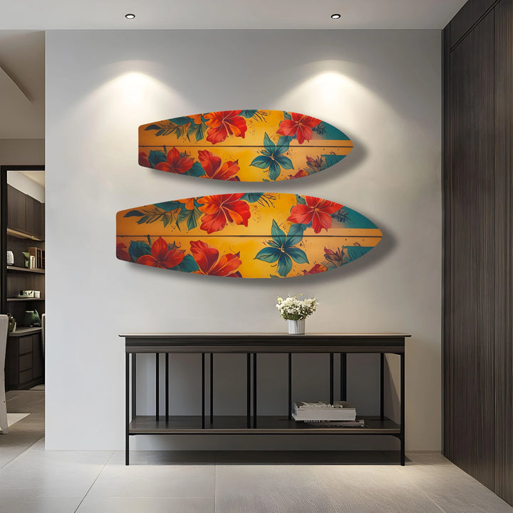 Illuminated, the brightest area features vintage surfboard wall prints showcasing colorful flowers, adding a vibrant, beach-themed touch to the decor.