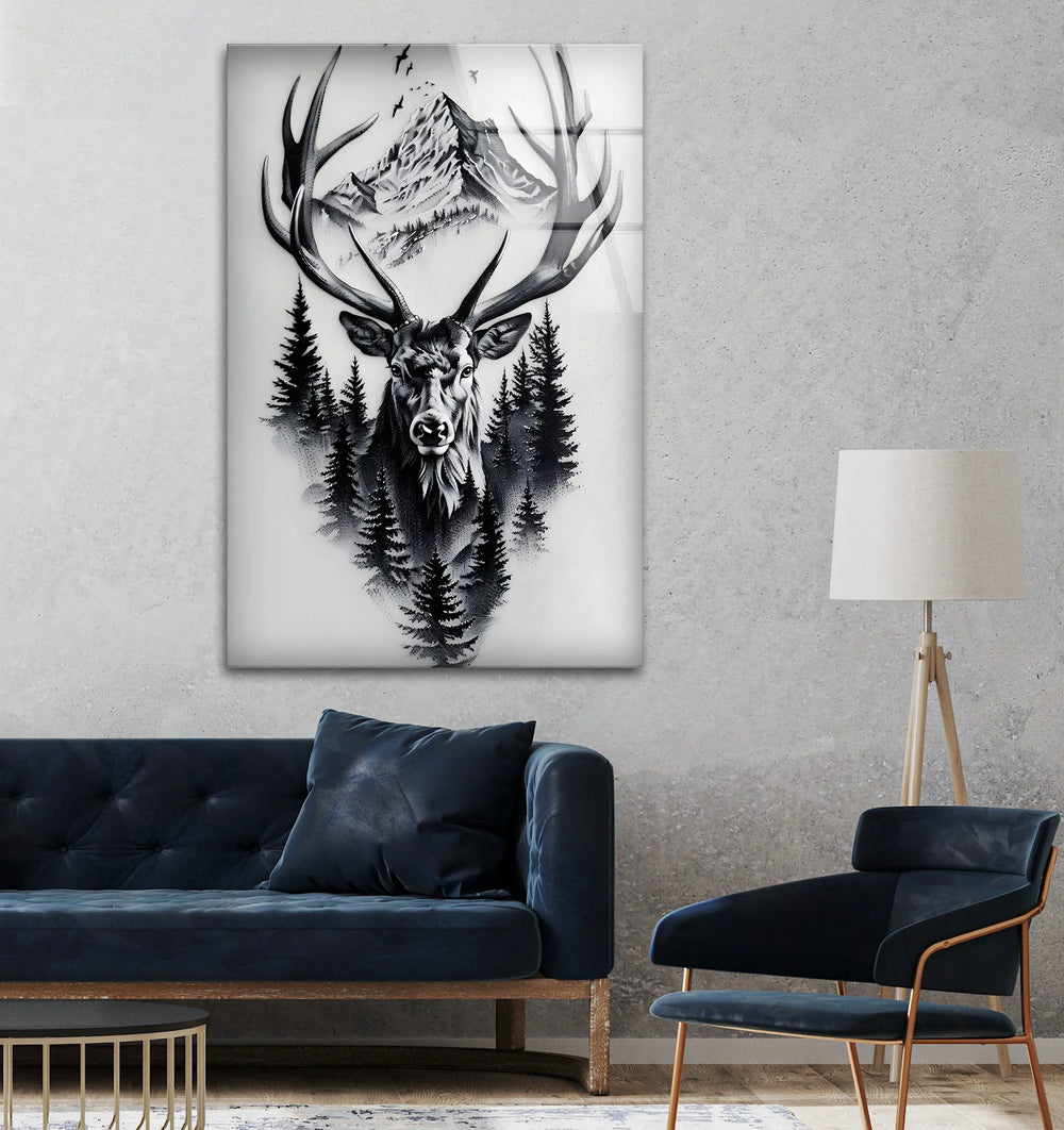 Monochrome glass art of a deer head framed by forest pines and distant mountain peaks.