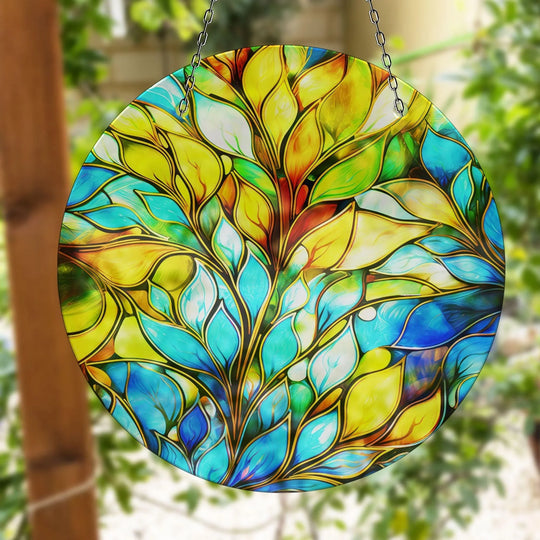 Suncatcher featuring blue and yellow leaves motif and stained glass effect and keyword leaves wall art and home decor accents