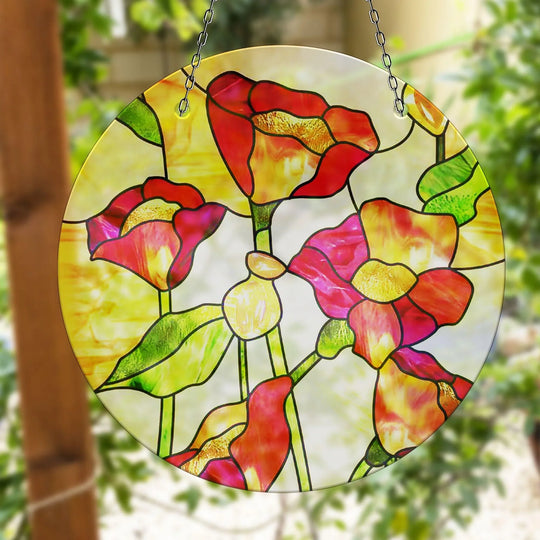 Vibrant red floral suncatcher with striking yellow accents acts as a piece of unique modern wall decor, casting a colorful and captivating light in any space.