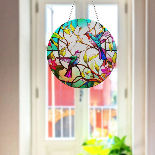 Subtle depth and layers create a captivating effect in this vibrant birds suncatcher, a unique glass art painting that adds a touch of colorful beauty.