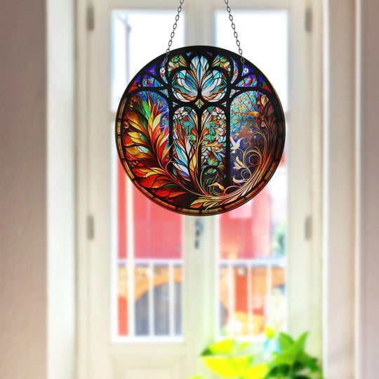 Visual rhythm flows through the floral stained suncatcher with its ornate details, bright colors, and symmetrical design that enhances the glass wall art decor.