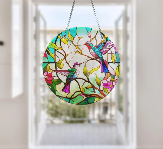 Cheerful mood radiates from this vivid colored birds suncatcher, an eye-catching piece of home decor with stained glass effects.