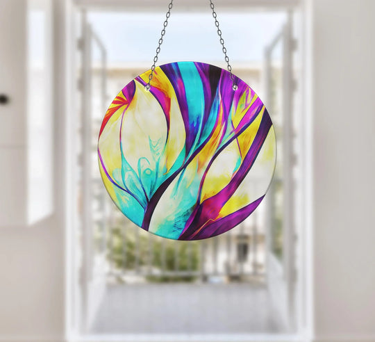 Intense color saturation makes this purple abstract suncatcher an eye-catching art from glass piece, perfect for adding vibrant hues to any window.