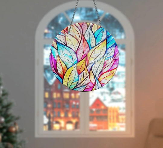 Presenting the abstract quality of a stained glass suncatcher, a stunning example of decorative wall art with colorful leaf patterns creating a mesmerizing, artistic display.