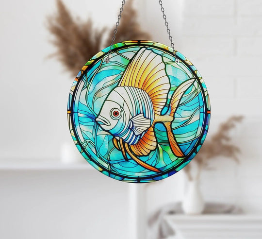 Dominant fish boldly takes center stage in this vibrant and detailed glass wall artwork suncatcher, featuring intricate details in shades of yellow, orange, and blue.