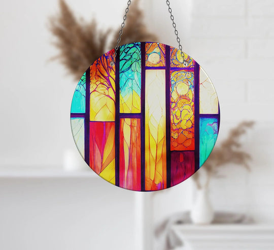 Intricate surface texture highlights the colorful details of this stained yellow and red glass printing suncatcher.