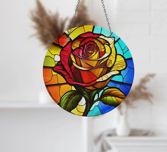 Highlighting the abstract quality, a stained rose suncatcher showcases colorful panes that create a vibrant, decorative wall art piece.