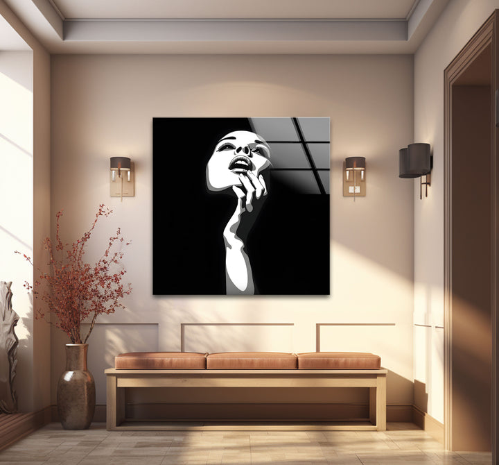 Modern black and white wall decor highlighting the beauty and elegance of a woman’s portrait.