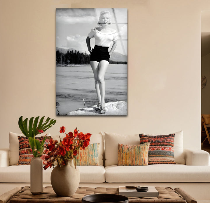 Timeless black and white paintings featuring Marilyn Monroe against a serene Alberta landscape.