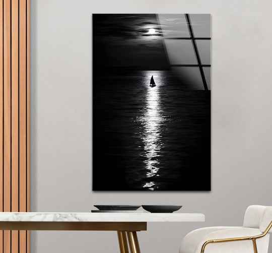 Realistic detail captures the black and white moonlight landscape art from glass, showcasing a sailboat on the water under a luminous moon.