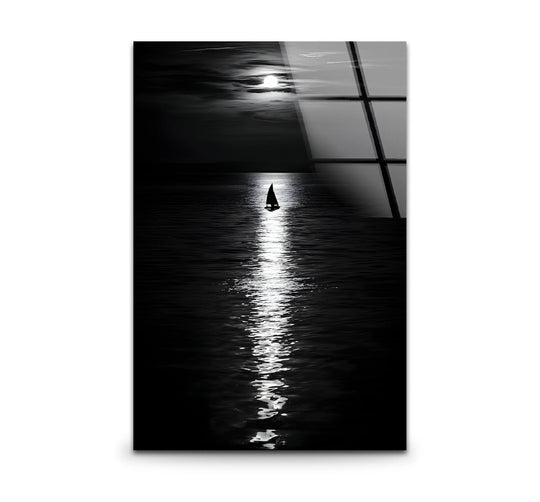 Depicting depth and layers through its monochrome scene, the black and white moonlight landscape hanging wall art showcases a sailboat amidst shimmering reflections.