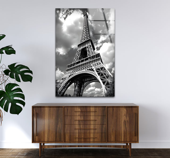 Captivating black and white wall decor featuring a close-up perspective of the Eiffel Tower in monochrome
