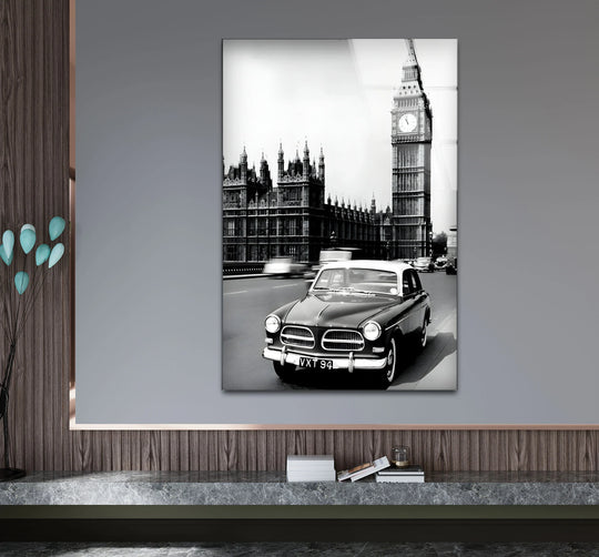 Showcasing the realistic detail of Black & White Old London Street Glass Wall Art as home decoration with Big Ben and vintage car, a striking city print.