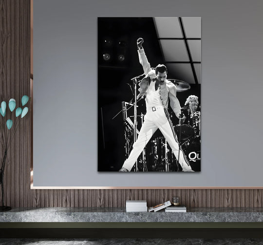 A dynamic black and white rock icon performance is depicted in this art from glass, featuring striking geometric stage lighting above.