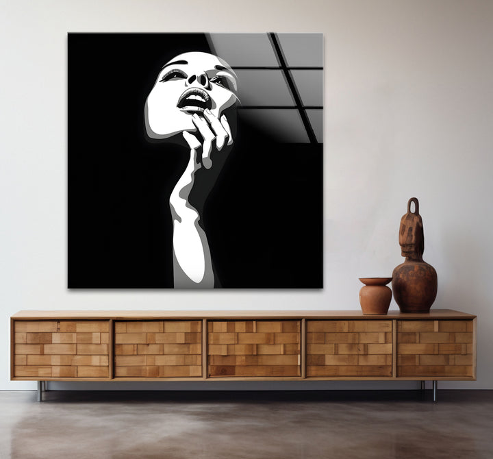Timeless black and white framed art capturing the essence of a woman’s face with minimalist details.
