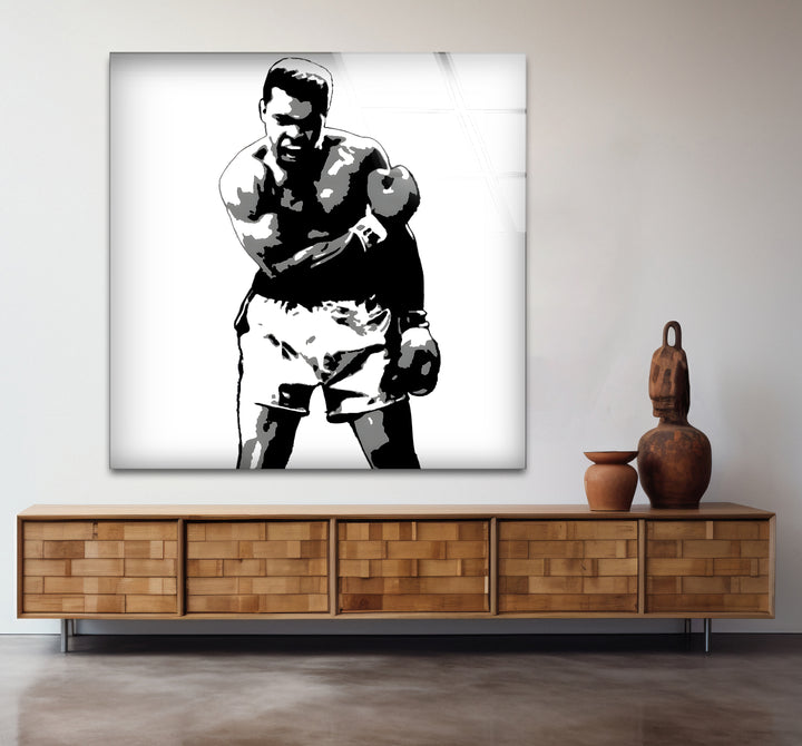 Modern black and white artwork highlighting the legacy of Muhammad Ali with bold contrasts
