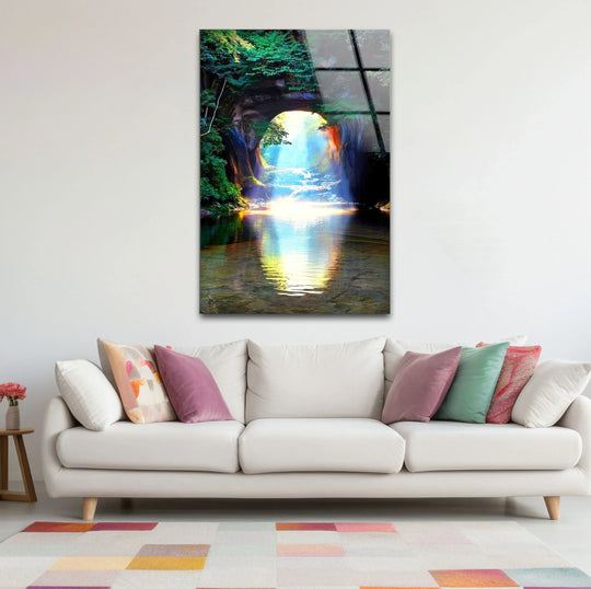 Glass wall art showing a sunlit forest tunnel with geometric reflections and colorful geometric rug patterns.