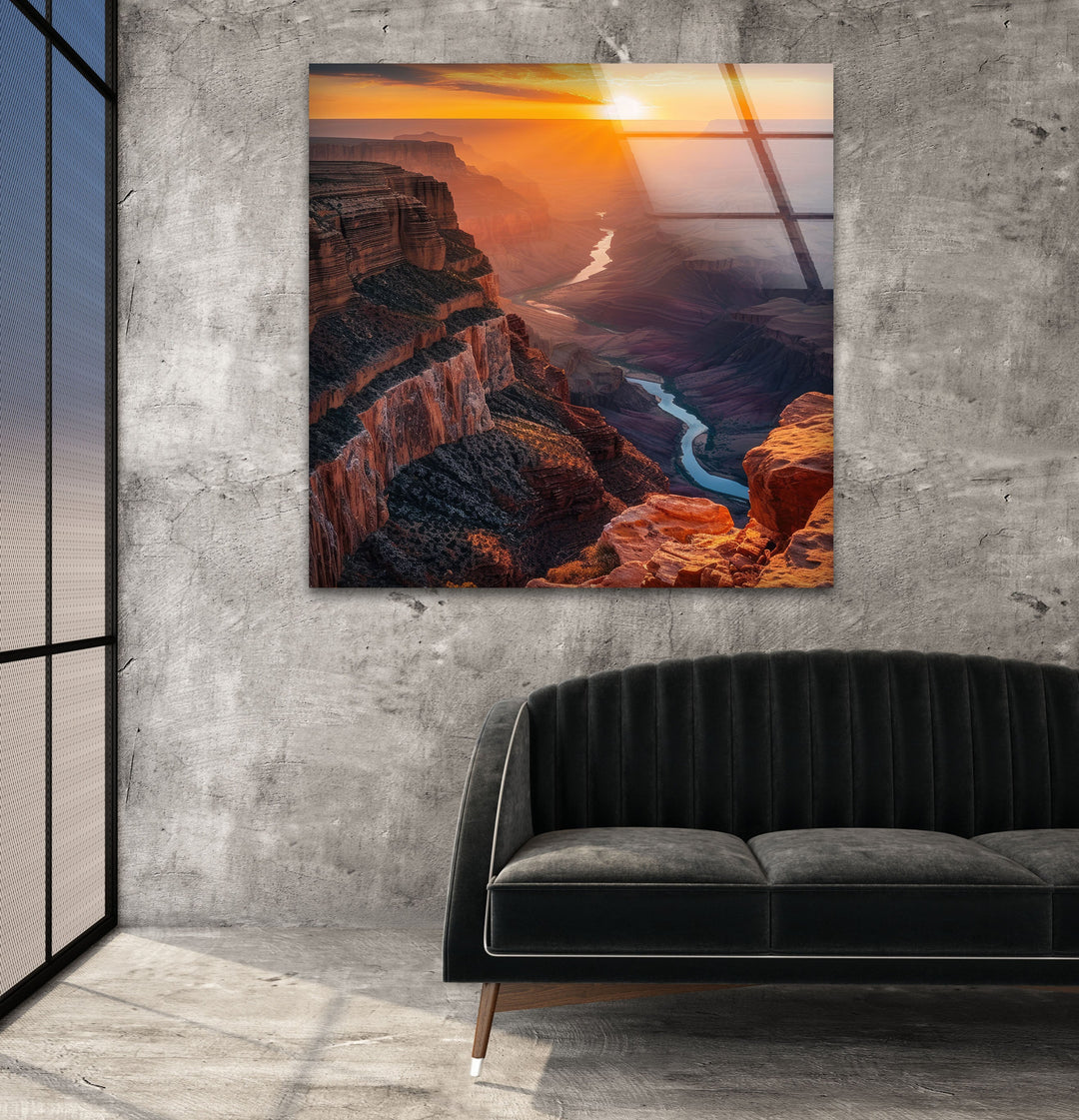Glass wall art featuring the Grand Canyon’s rugged cliffs in warm evening light.
