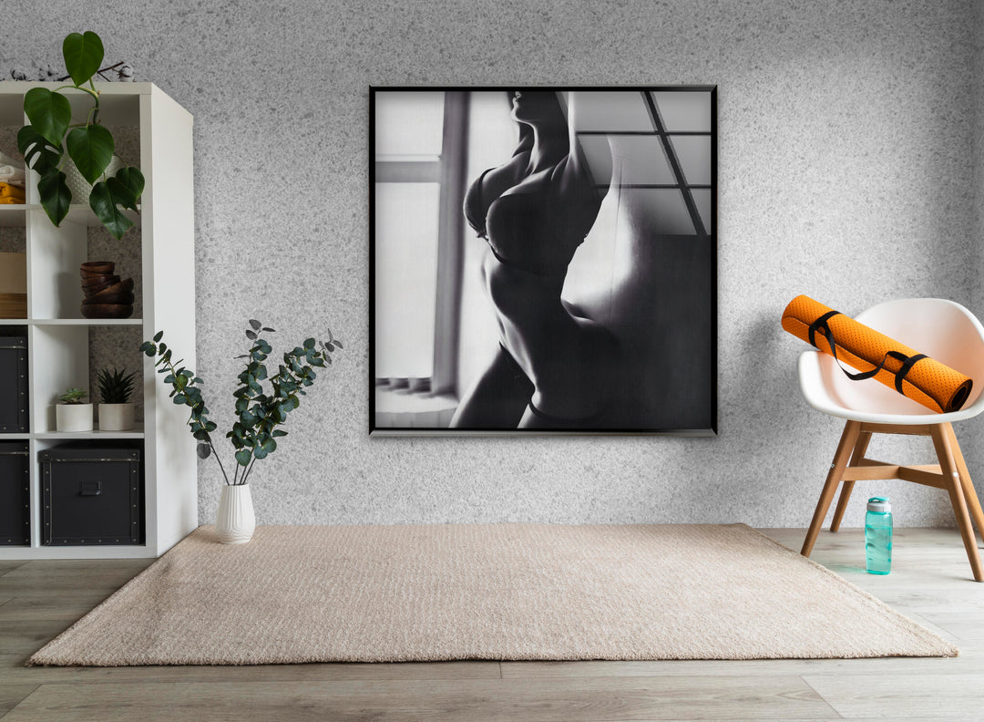 Sophisticated erotic nude art paired with sleek glass wall decor ideas
