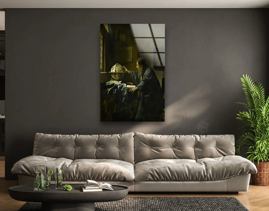 An astronomer contemplates a globe, layered in the dramatic shadows of this glass wall art decor.