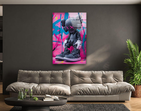 The cool art glass wall art features Kaws wearing Nike and a graffiti backdrop and brings modern urban decor and vibrant style to any modern art lovers space
