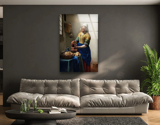 A vintage milkmaid pouring milk is the focal point of this unique modern wall decor glass art.