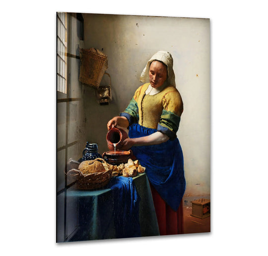 The brightest area of this famous Vermeer painting, available as home decor, focuses on the light illuminating the milkmaid's face and the pouring milk.